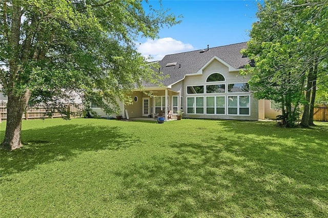 1424 Woodmere Dr, Mandeville, LA 70471 - rear view of house with roof with shingles