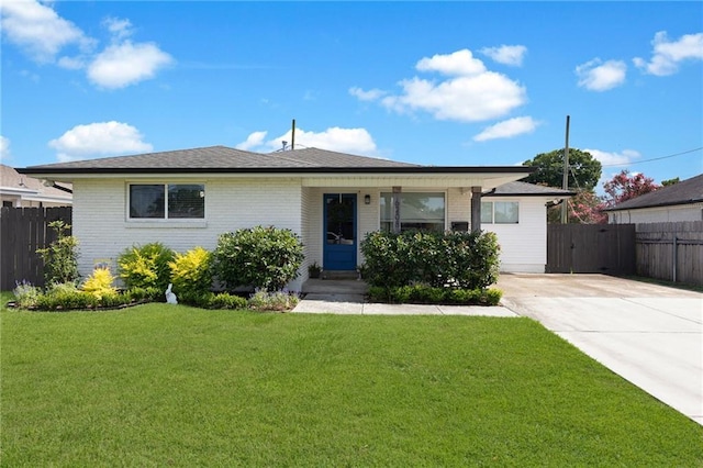 6208 Lafreniere St, Metairie, LA 70003 - view of front facade with concrete driveway and brick siding