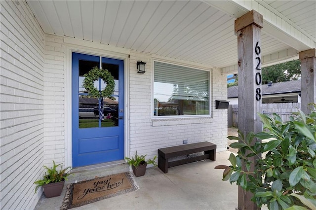6208 Lafreniere St, Metairie, LA 70003 - view of exterior entry featuring brick siding
