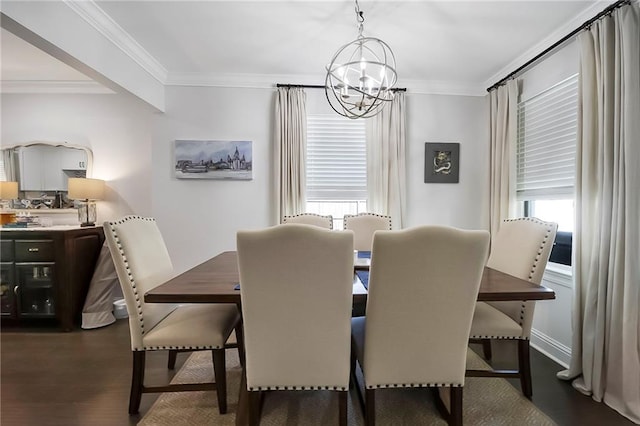 6208 Lafreniere St, Metairie, LA 70003 - dining space featuring a chandelier, crown molding, and dark wood-type flooring