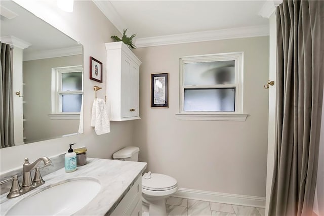 6208 Lafreniere St, Metairie, LA 70003 - full bath with toilet, crown molding, vanity, marble finish flooring, and baseboards