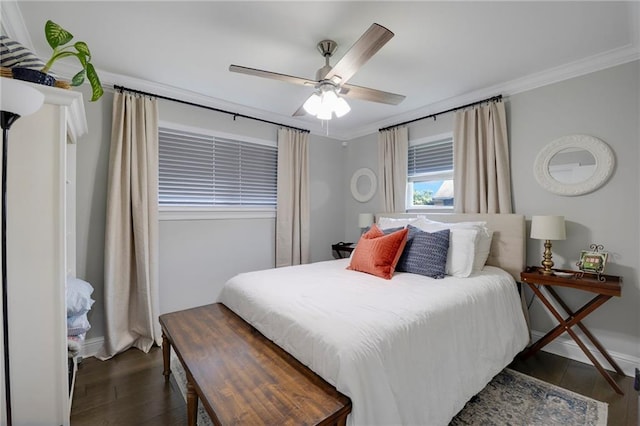 6208 Lafreniere St, Metairie, LA 70003 - bedroom featuring dark wood-style floors, ornamental molding, baseboards, and ceiling fan