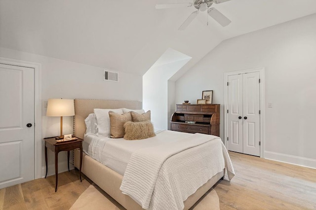 65 Hummingbird Rd, Covington, LA 70433 - bedroom featuring light wood-type flooring, vaulted ceiling, a ceiling fan, and baseboards