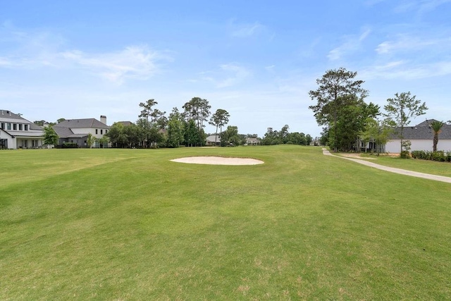65 Hummingbird Rd, Covington, LA 70433 - view of community with a lawn and view of golf course