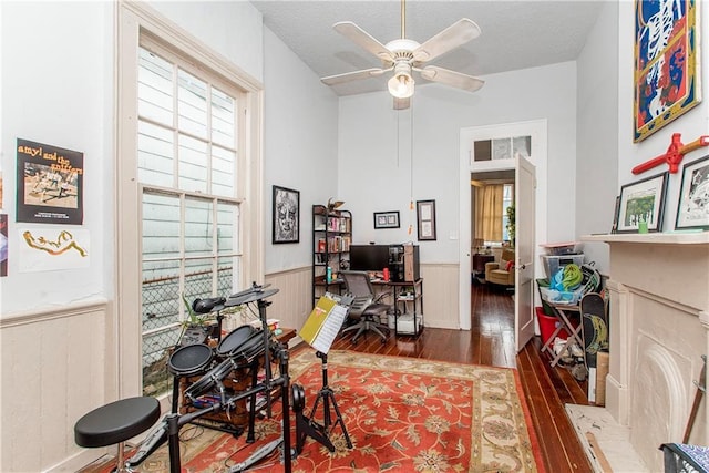 262830 N Rampart St, New Orleans, LA 70117 - office with hardwood / wood-style floors, wainscoting, a ceiling fan, and a textured ceiling