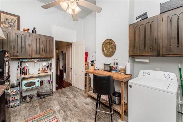 262830 N Rampart St, New Orleans, LA 70117 - washroom featuring washer / clothes dryer, a ceiling fan, and light wood-style flooring