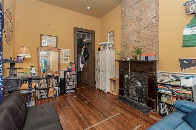262830 N Rampart St, New Orleans, LA 70117 - living room with wood-type flooring and a large fireplace