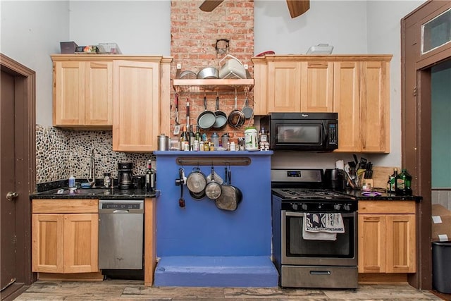 262830 N Rampart St, New Orleans, LA 70117 - kitchen with appliances with stainless steel finishes, light brown cabinets, a sink, and light wood finished floors
