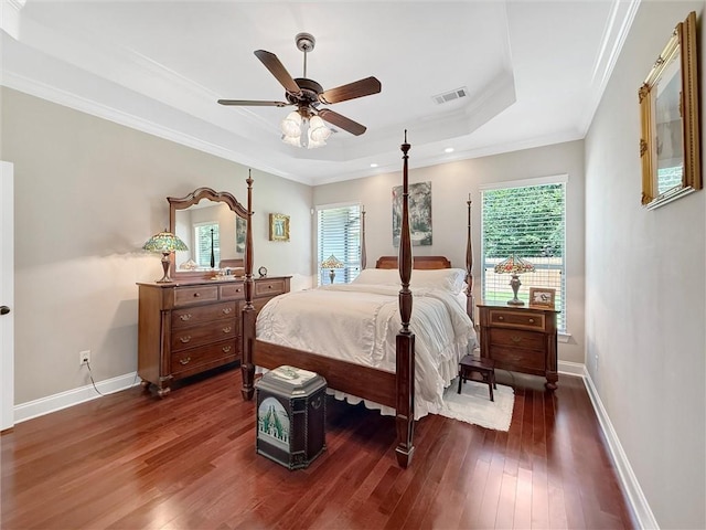 232 Old Mill Loop, Pearl River, LA 70452 - bedroom featuring a raised ceiling, dark wood-style flooring, baseboards, crown molding, and a ceiling fan