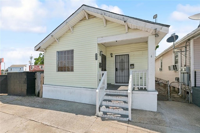 261315 N Prieur St, New Orleans, LA 70117 - shotgun-style home featuring a porch