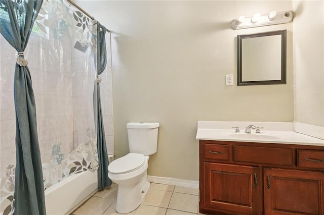 261315 N Prieur St, New Orleans, LA 70117 - bathroom with tile patterned flooring, toilet, shower / tub combo, vanity, and baseboards