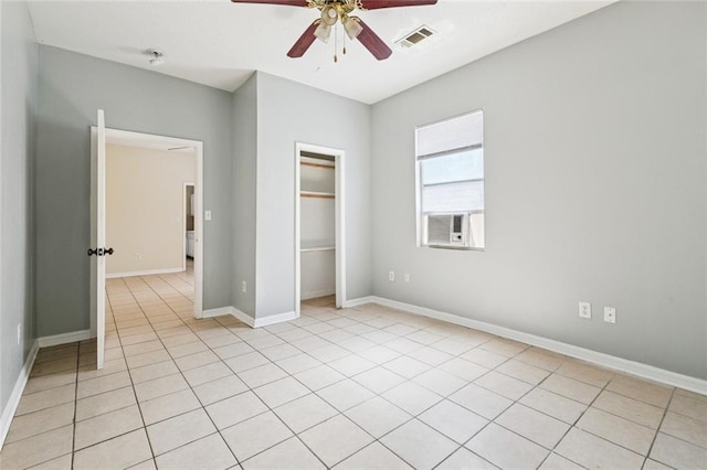 261315 N Prieur St, New Orleans, LA 70117 - unfurnished bedroom with a closet, baseboards, ceiling fan, and light tile patterned floors