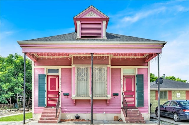 312426 N Robertson St, New Orleans, LA 70117 - view of front of home with entry steps and a shingled roof