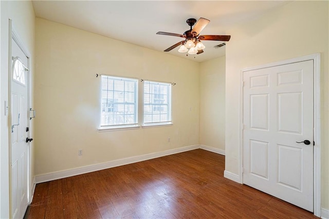 1606 N Broad St, New Orleans, LA 70119 - entryway with wood finished floors, a ceiling fan, and baseboards