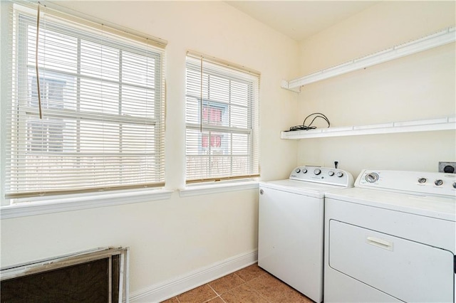 1606 N Broad St, New Orleans, LA 70119 - laundry room featuring independent washer and dryer, baseboards, and light tile patterned floors