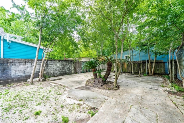 1606 N Broad St, New Orleans, LA 70119 - fenced backyard featuring a patio area
