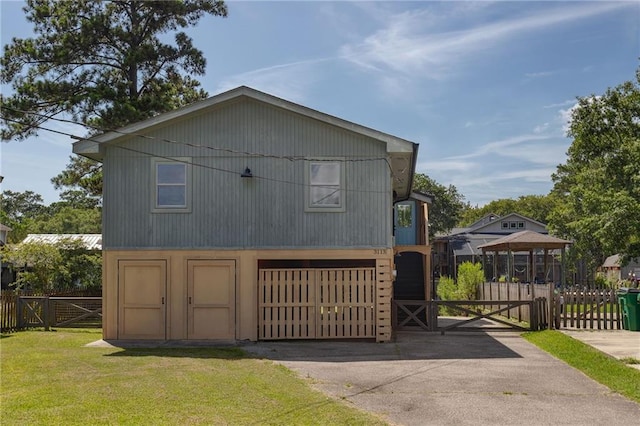 3113 Bayou View Pl, Slidell, LA 70458 - view of front of property with a gate, driveway, and an attached garage