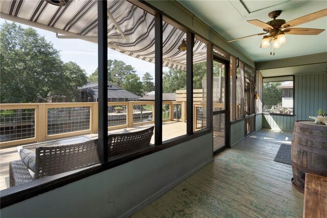 3113 Bayou View Pl, Slidell, LA 70458 - sunroom / solarium featuring a ceiling fan