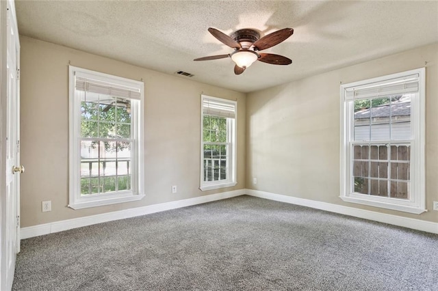 1928 Barbara Dr, Slidell, LA 70458 - carpeted spare room featuring plenty of natural light, baseboards, and a textured ceiling