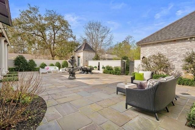 1322 S Jahncke Ave, Covington, LA 70434 - view of patio featuring an outdoor living space