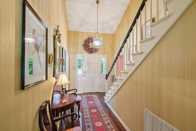 214 Tchefuncte Dr, Covington, LA 70433 - foyer featuring a chandelier and stairs