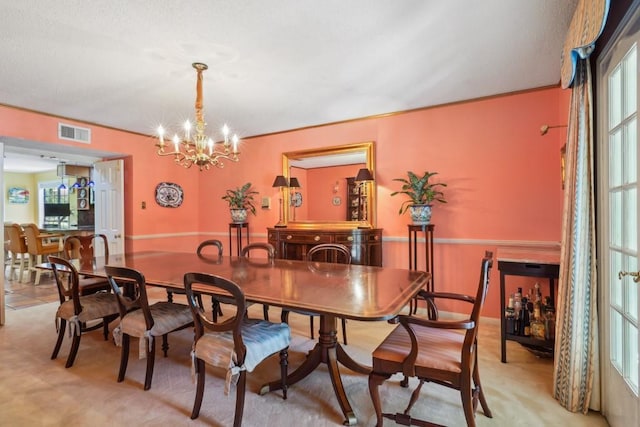 214 Tchefuncte Dr, Covington, LA 70433 - dining space featuring plenty of natural light and a chandelier