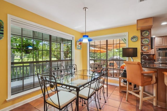 214 Tchefuncte Dr, Covington, LA 70433 - dining room featuring light tile patterned floors