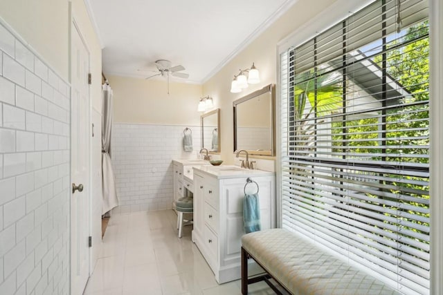 214 Tchefuncte Dr, Covington, LA 70433 - full bathroom with tile walls, ceiling fan, double vanity, tile patterned flooring, and ornamental molding