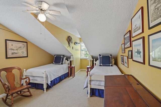 214 Tchefuncte Dr, Covington, LA 70433 - bedroom featuring a textured ceiling, vaulted ceiling, carpet floors, and ceiling fan