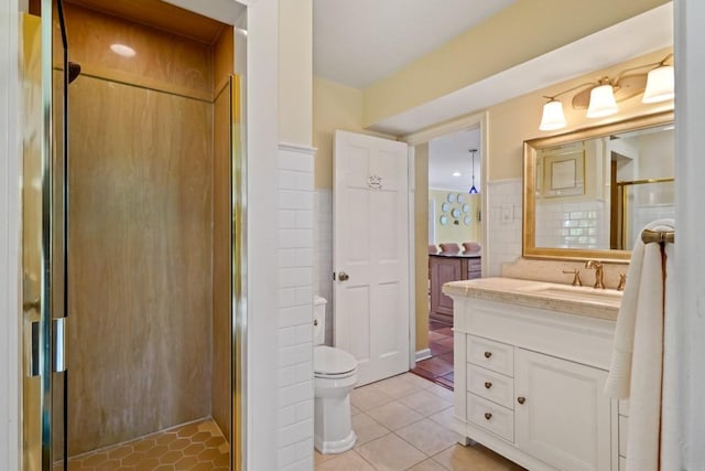 214 Tchefuncte Dr, Covington, LA 70433 - full bath featuring tile patterned flooring, a shower stall, vanity, and toilet