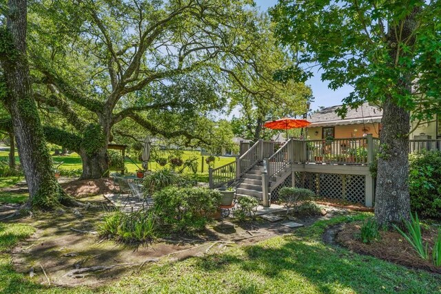 214 Tchefuncte Dr, Covington, LA 70433 - view of yard with a wooden deck and stairs