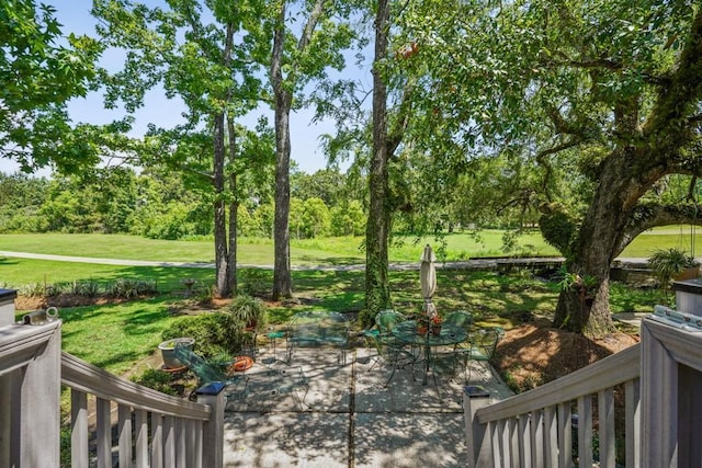 214 Tchefuncte Dr, Covington, LA 70433 - view of patio / terrace with view of wooded area