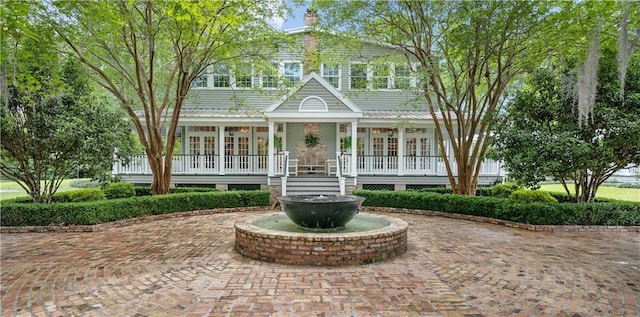 20263 Brunning Rd, Covington, LA 70435 - view of front of home featuring covered porch and french doors