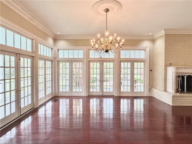 20263 Brunning Rd, Covington, LA 70435 - unfurnished sunroom with french doors and a chandelier