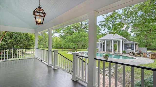 20263 Brunning Rd, Covington, LA 70435 - view of patio featuring a storage structure, an outbuilding, and view of scattered trees