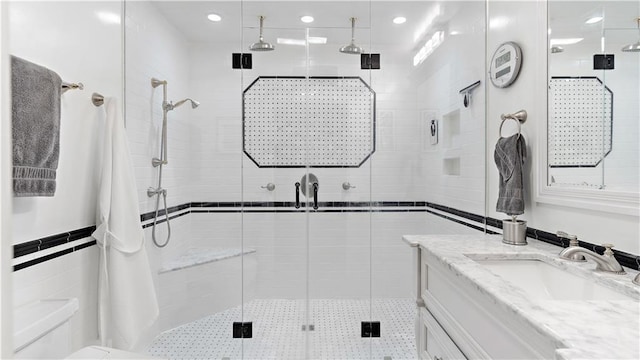 20263 Brunning Rd, Covington, LA 70435 - bathroom with vanity, a stall shower, toilet, and recessed lighting