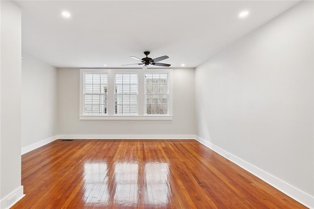 1530 Bordeaux St Unit C, New Orleans, LA 70115 - unfurnished room with a ceiling fan, hardwood / wood-style floors, baseboards, and recessed lighting