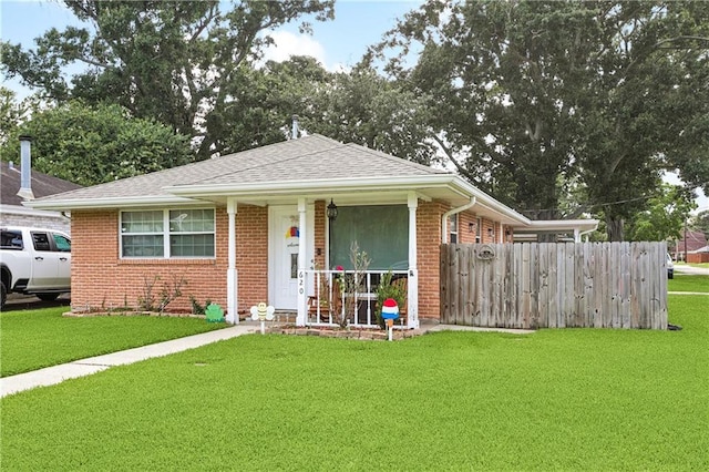 620 Maryland Ave, Metairie, LA 70003 - view of front of house featuring brick siding and roof with shingles
