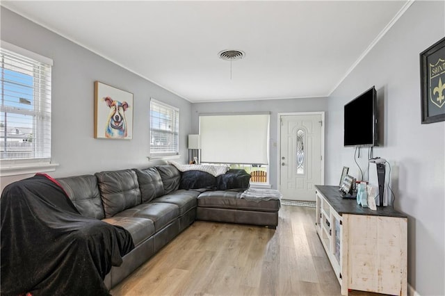 620 Maryland Ave, Metairie, LA 70003 - living room with ornamental molding and light wood-type flooring