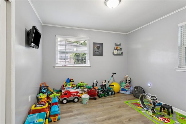 620 Maryland Ave, Metairie, LA 70003 - recreation room featuring crown molding and wood finished floors