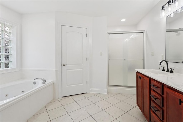 204 Annette Dr, Slidell, LA 70458 - bathroom with vanity, a jetted tub, a shower stall, tile patterned flooring, and recessed lighting