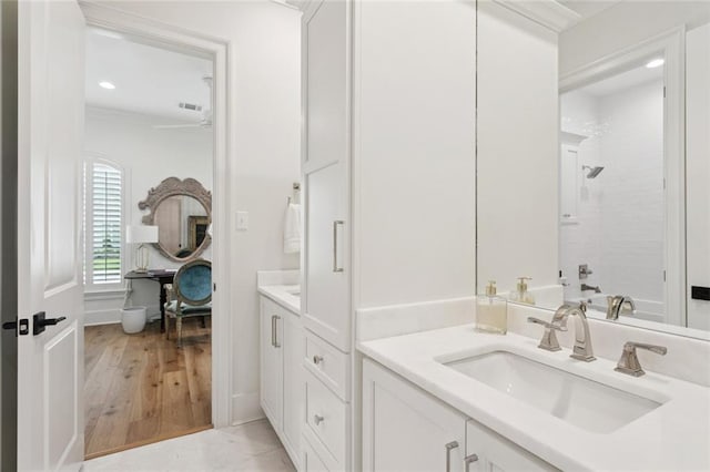 516 N Corniche Du Lac, Covington, LA 70433 - full bathroom with vanity, a shower, recessed lighting, wood finished floors, and ornamental molding