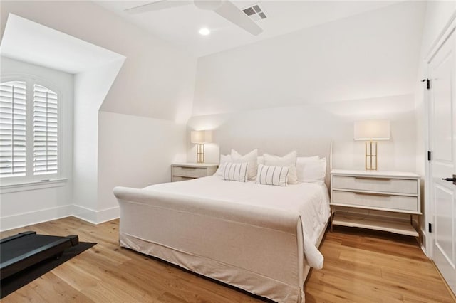 516 N Corniche Du Lac, Covington, LA 70433 - bedroom with wood finished floors, baseboards, ceiling fan, recessed lighting, and lofted ceiling
