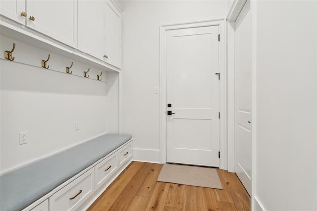 516 N Corniche Du Lac, Covington, LA 70433 - mudroom featuring light wood-type flooring and baseboards