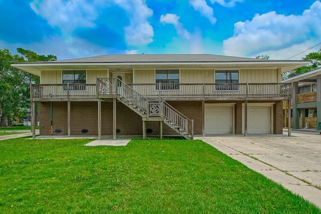 3046 S Palm Dr, Slidell, LA 70458 - view of front facade featuring a front lawn, an attached garage, driveway, and stairway