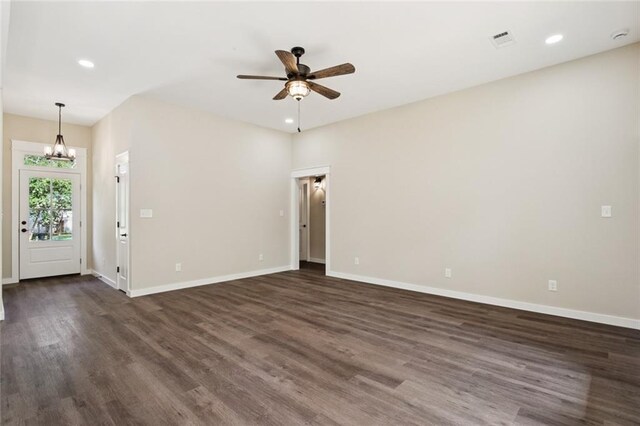 4251 Poplar Dr, Slidell, LA 70461 - unfurnished room with a chandelier, ceiling fan, dark wood-style flooring, recessed lighting, and baseboards