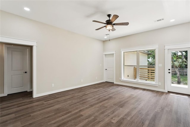 4251 Poplar Dr, Slidell, LA 70461 - spare room featuring dark wood-style floors, a ceiling fan, baseboards, and recessed lighting