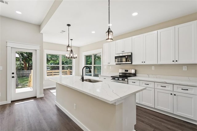 4251 Poplar Dr, Slidell, LA 70461 - kitchen with a sink, stainless steel appliances, dark wood-type flooring, baseboards, and recessed lighting
