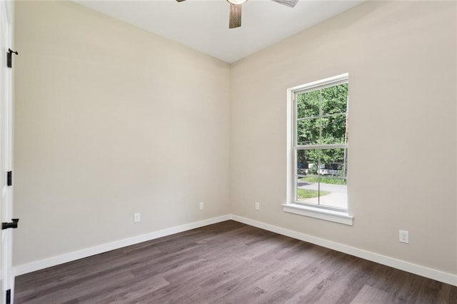 4251 Poplar Dr, Slidell, LA 70461 - spare room featuring healthy amount of natural light, baseboards, ceiling fan, and dark wood-type flooring