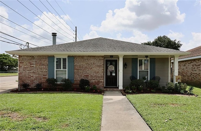 3444 Texas Ave, Kenner, LA 70065 - ranch-style house featuring a front yard, brick siding, and roof with shingles